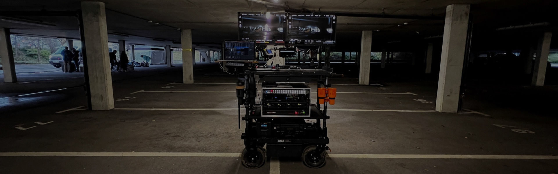 DIT cart on location with stacked monitors